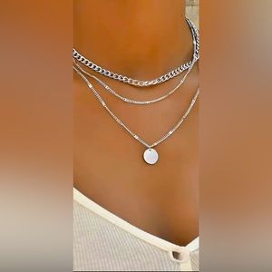 Vintage style round charm layered necklace. Only available in gold color